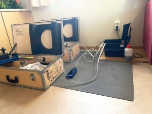 Portable HERMetic UTImeter Gtex Ullage Temperature Interface tank gauging device mounted on a tanker ship deck, showing the tape reel, sensor probe, and display ready for closed gauging of liquid cargo.