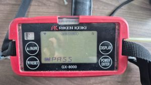 Riken Keiki GX-8000 multi gas detector showing PASS result after calibration and health check on board a ship